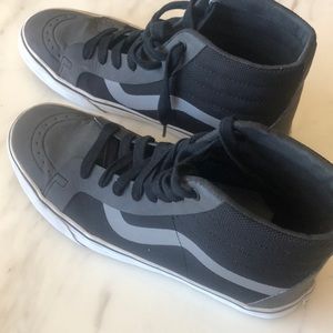 Black and silver high top vans. Excellent condition!